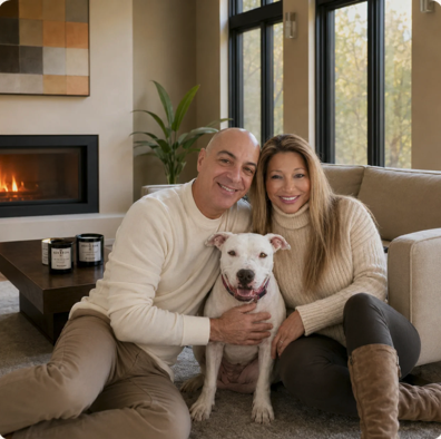 Lior and AnnMarie on the floor at home with their dog